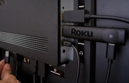 a Roku device plugged into a TV