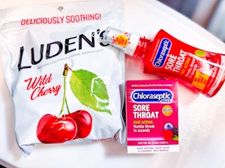 chloraseptic throat spray and lozenges and ludens drops on table at walmart