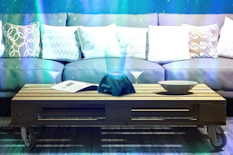 a galaxy projector on a table