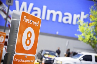 Walmart pickup parking sign and number outside walmart 