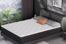 a mattress in a bedroom