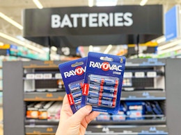 In-store photo of Rayvac Batteries at Walmart (8-pack held up in front of signage)