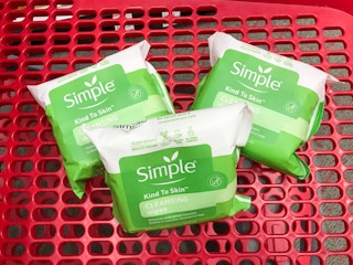 three packs of Simple wipes in Target shopping cart