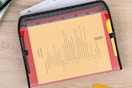 Five Star Expanding File Organizer with paper inside it
