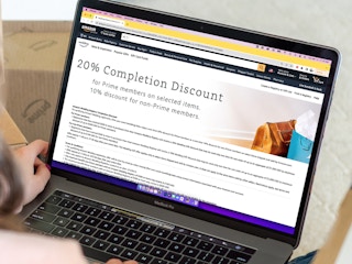 a person looking at the amazon wedding registry discount on their macbook