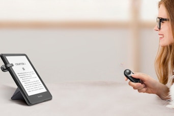 a woman using a remote page turner
