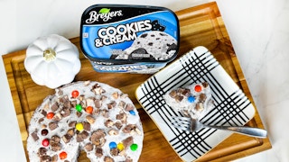 Breyers cookie and cream ice cream and a diy ice cream pie on counter 