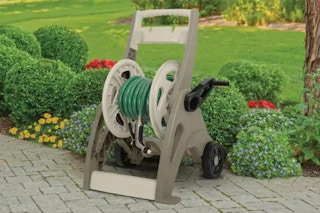 hose reel set up on the edge of a patio