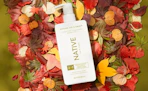a bottle shampoo on fall leaves