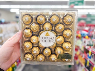 hand holding ferrero rocher candy