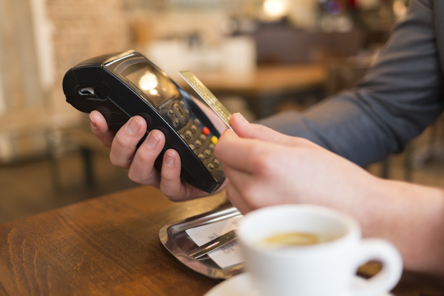 Person paying with a contactless card