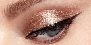 An eye with Stila bronzed bell liquid eyeshadow applied