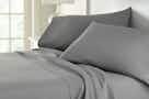grey sheet sets on a bed