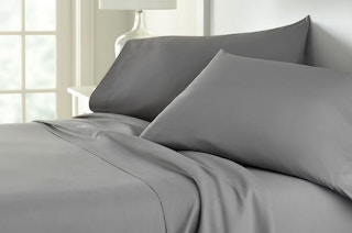 grey sheet sets on a bed