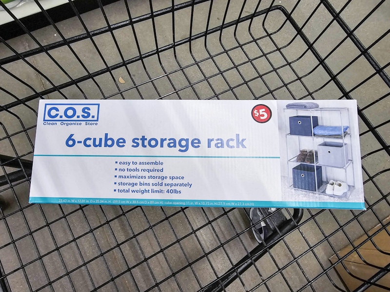 box containing a cube storage rack in a cart