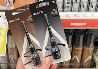 hand holding almay eye liner