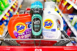 tide pods, downy unstoppables, and liquid tide in a cart