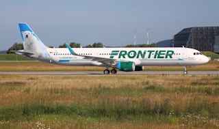 frontier airlines plane during takeoff or landing
