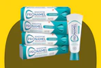 Sensodyne Pronamel Fresh Breath Enamel Toothpaste on a yellow background.