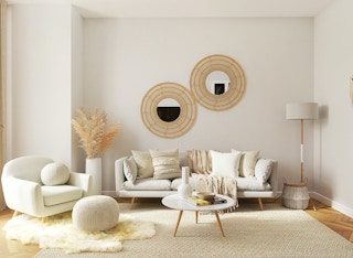 Open concept living room with white furniture