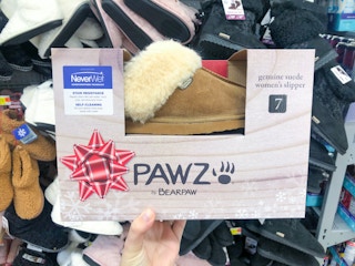 hand holding up pawz-bearpaw-slippers at Walmart