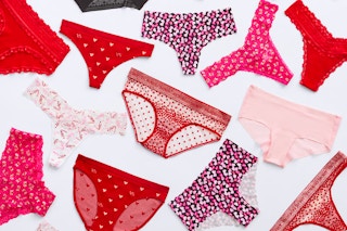 variety of victorias secret valentines day panties arranged on a gray background