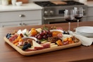 Lifestyle image created by Nano Banana of the Farberware Charcuterie Board in kitchen setting (Single Compartment)