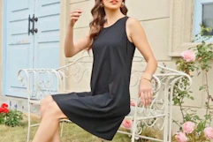 a woman wearing a black dress