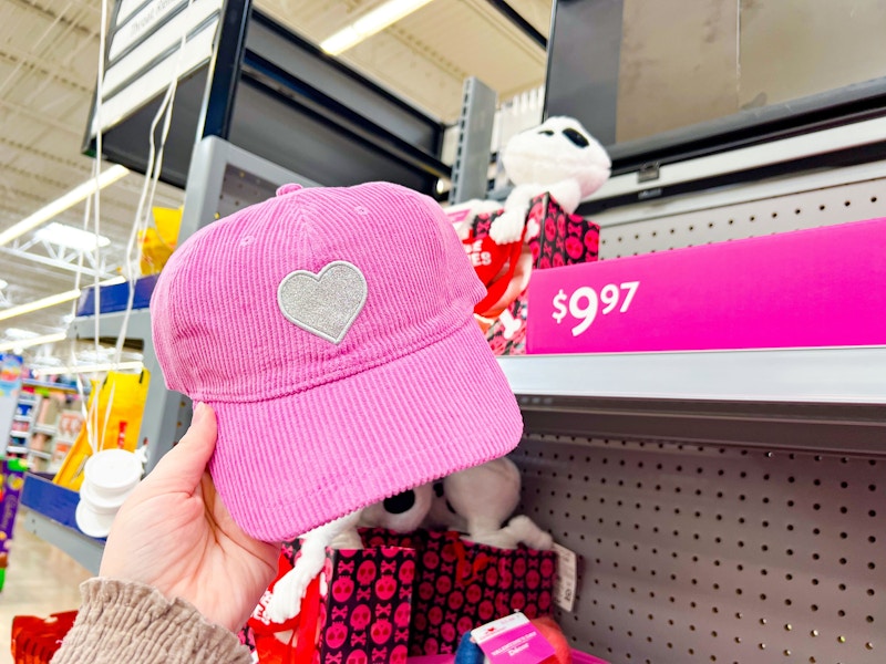 hand holding corduroy baseball hat at walmart