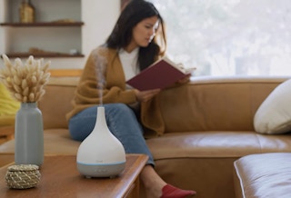 Essential oil diffuser on a table in a living room