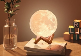 moon lamp sitting on desk