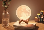 moon lamp sitting on desk
