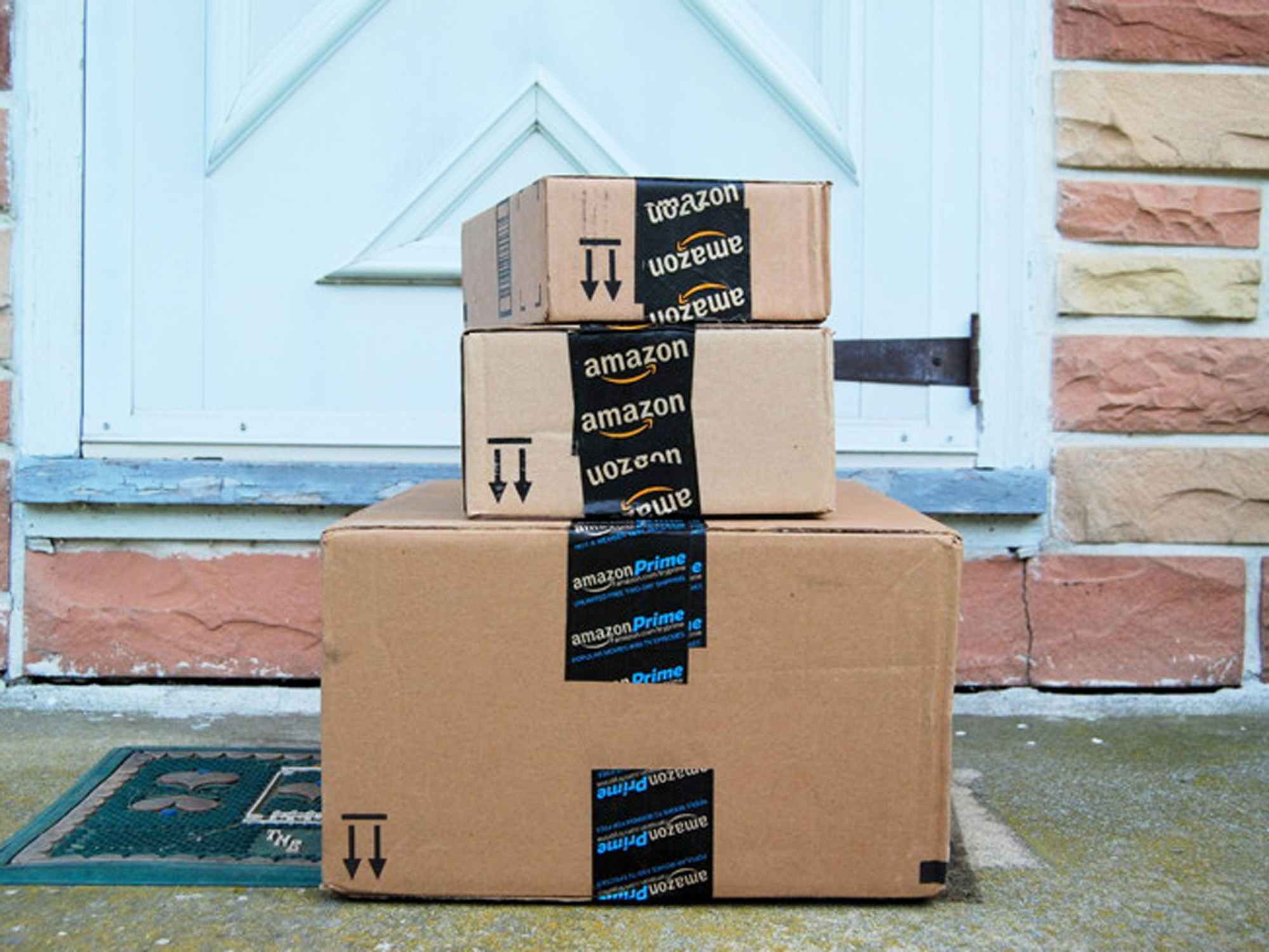 three amazon prime boxes stacked on top of each other