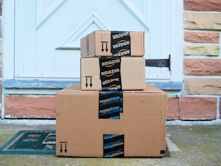 three amazon prime boxes stacked on top of each other