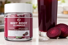 container of beet root gummies next to drink and beat