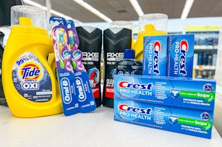 store counter with laundry detergent, toothbrushes, shampoo, and toothpaste