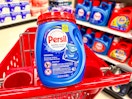 persil laundry detergent pacs sitting on a target cart