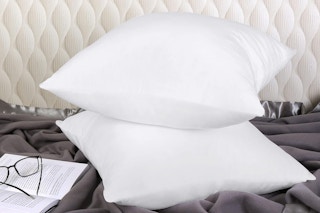 throw pillows on a bed