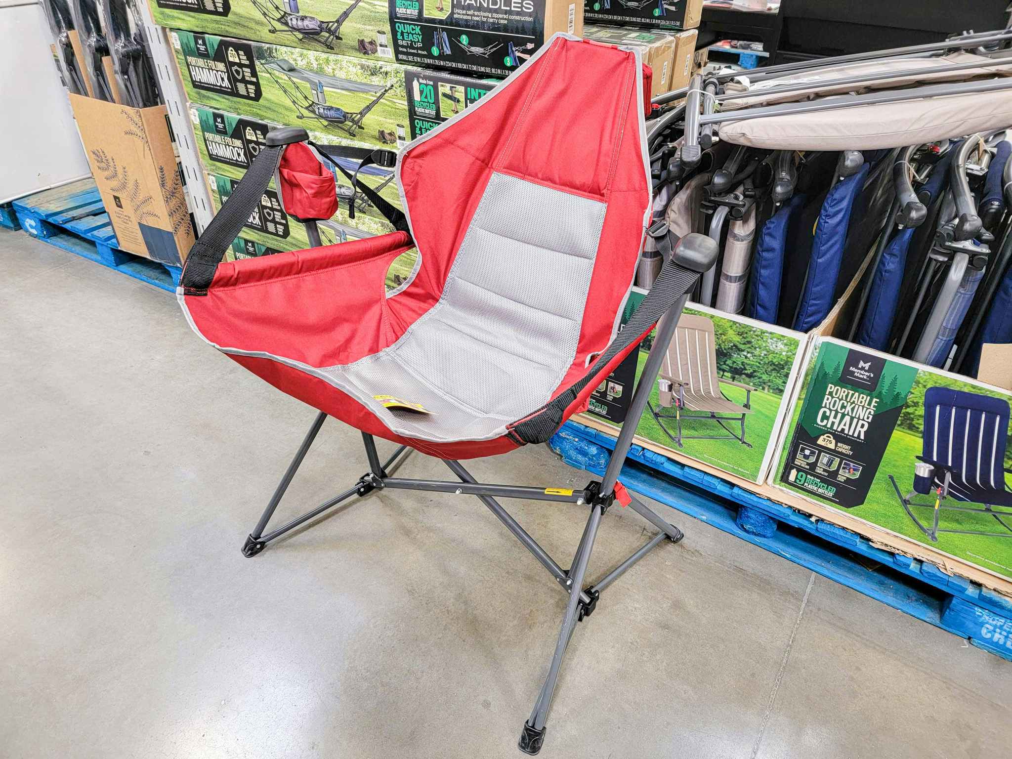 red camp chair that swings
