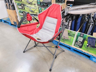 red camp chair that swings
