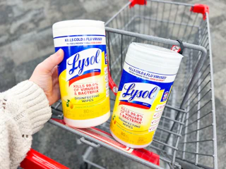 two lysol wipes canisters in a shopping cart