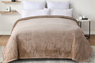 Bed with a plush king blanket