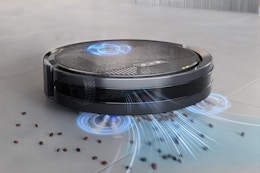 Robot vacuum and mop combo picks up crumbs from floor