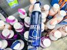 a blue water bottle on top of water bottles 