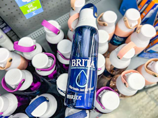 a blue water bottle on top of water bottles
