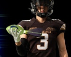 a football player holding a foam football