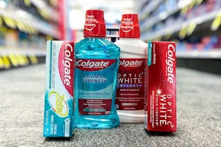 two Colgate toothpaste and two Colgate mouthwashes in aisle