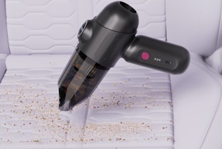 a car vacuum vacuuming up crumbs
