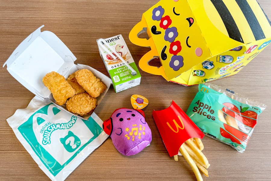 squishmallow happy meal laying out on a table