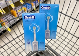 two oral-b vitality rechargeable toothbrushes in a walgreens cart